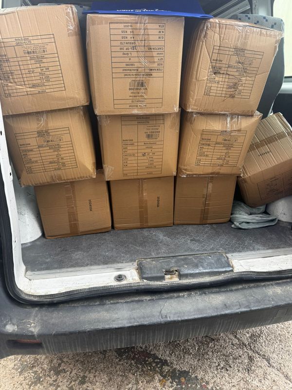 Van loaded with boxes of supplies ready for delivery